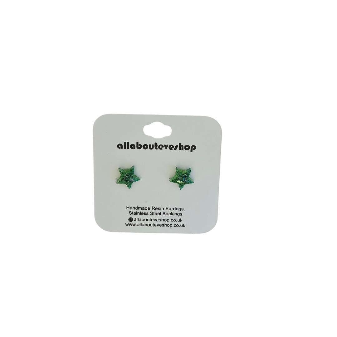 Green star stud earrings with stainless steel backing.
