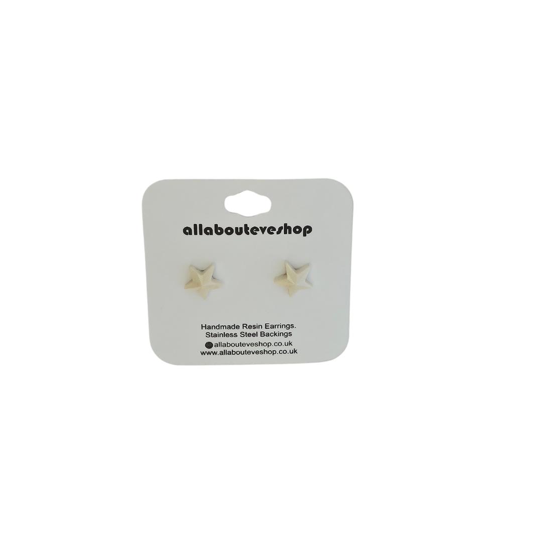 Pearl star stud earrings with stainless steel backing.